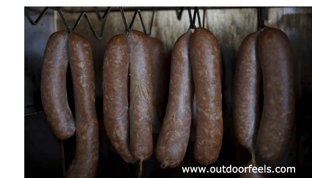 An Image showing curing sausage for smoking