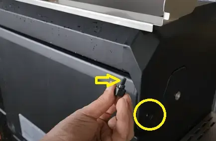 Removing screws.