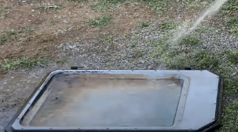 Cleaning window glass with water